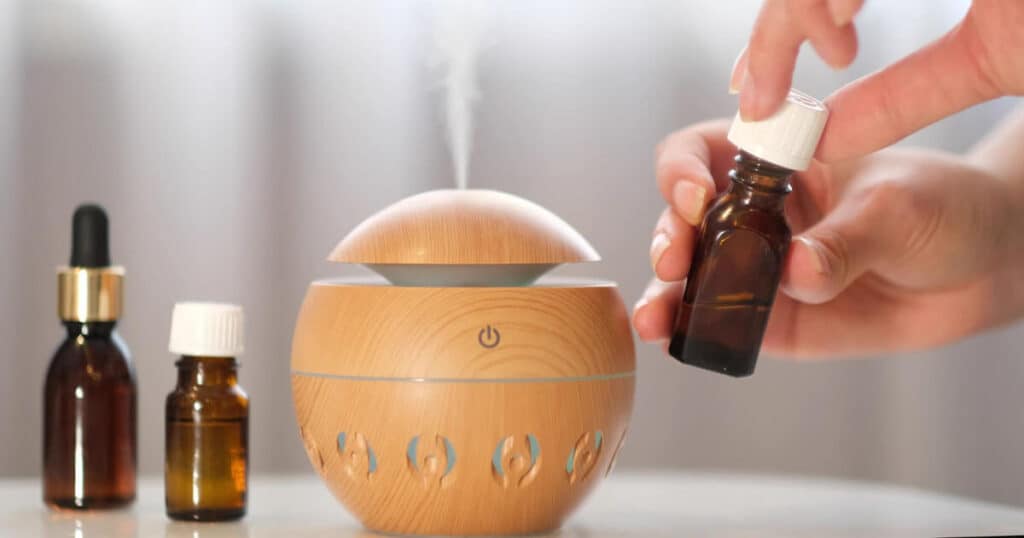 essential-oil-putting-in-diffuser