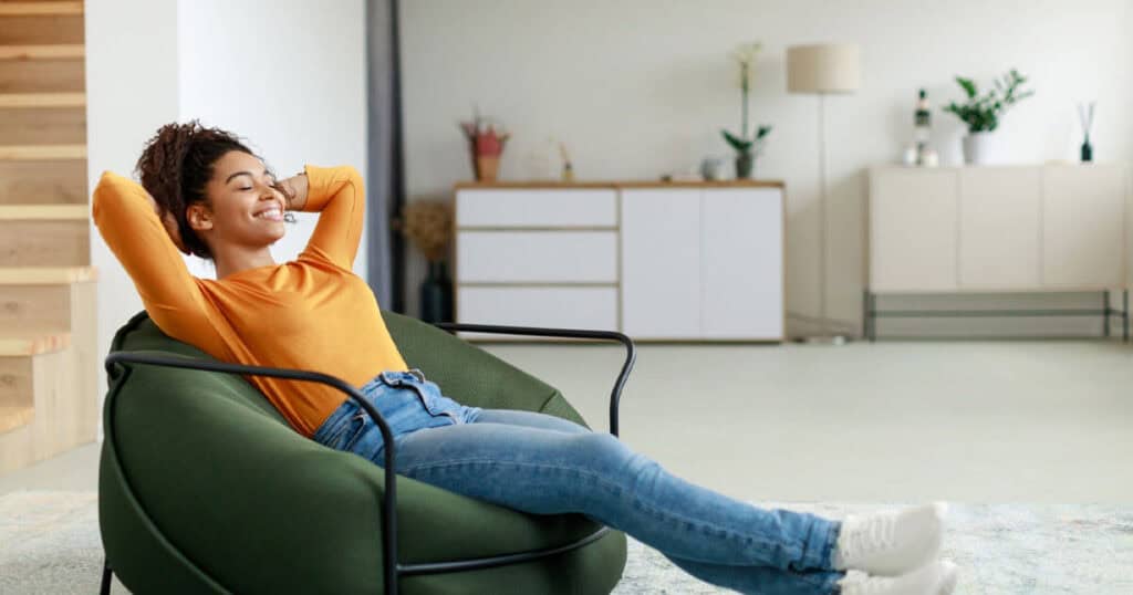 lady-enjoying-the-fresh-air-in-living-room