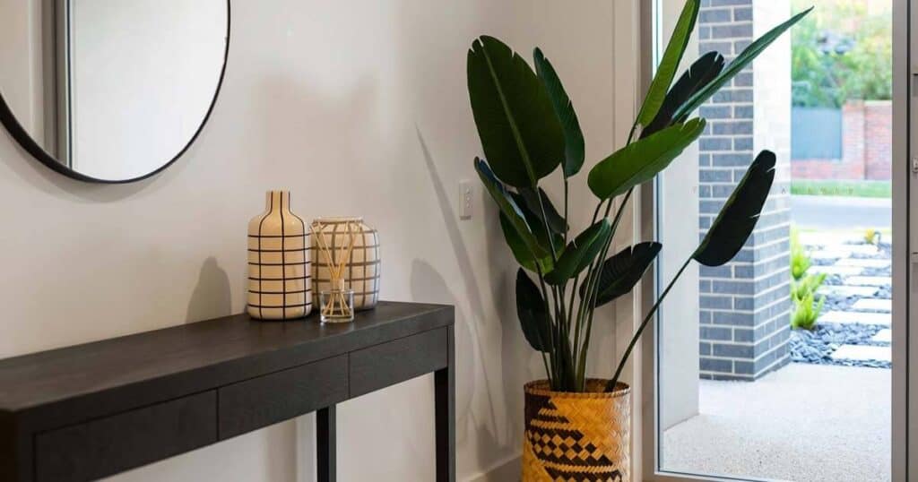The 10 Healthiest Ways to Fragrance Your Home: A 2026 Guide 35 home entry way with reed diffuser in the table