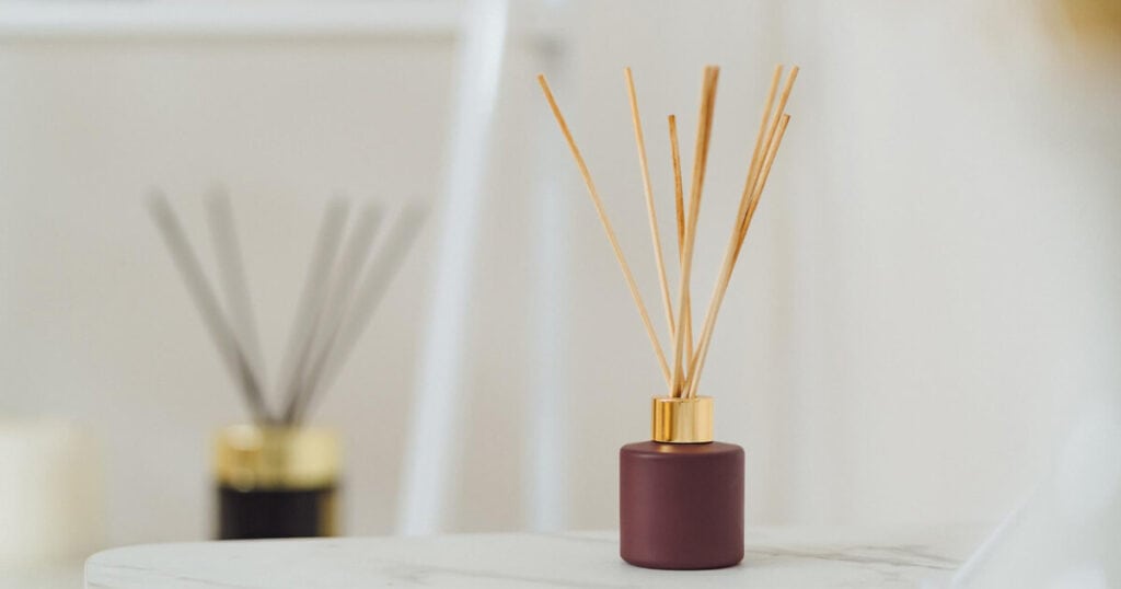 Budget vs Luxury Reed Diffusers: Are Premium Brands Really Worth It? 23 small sized reed diffuser in living room table
