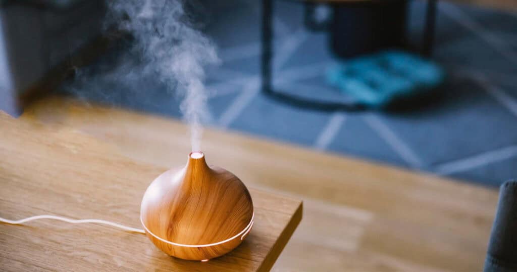 12 Best Low-Maintenance Diffusers for Daily Use at Home 10 wooden essential oil diffuser in the living room